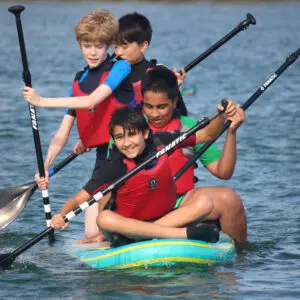 students on a paddle boat